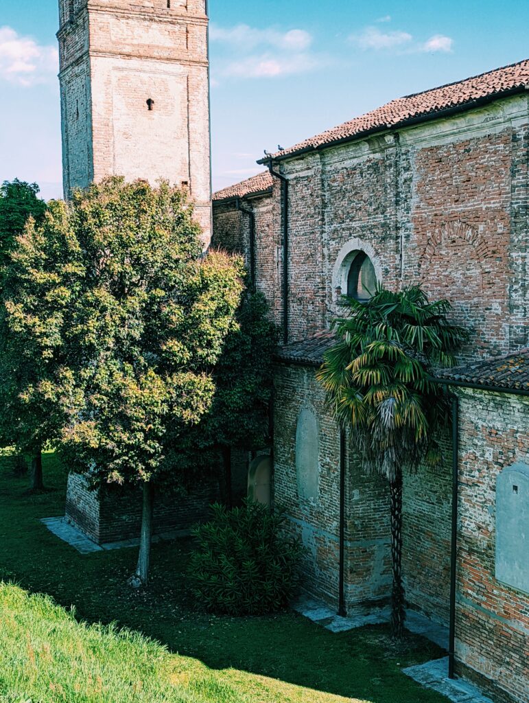 Curch with palm tree in Lombardy