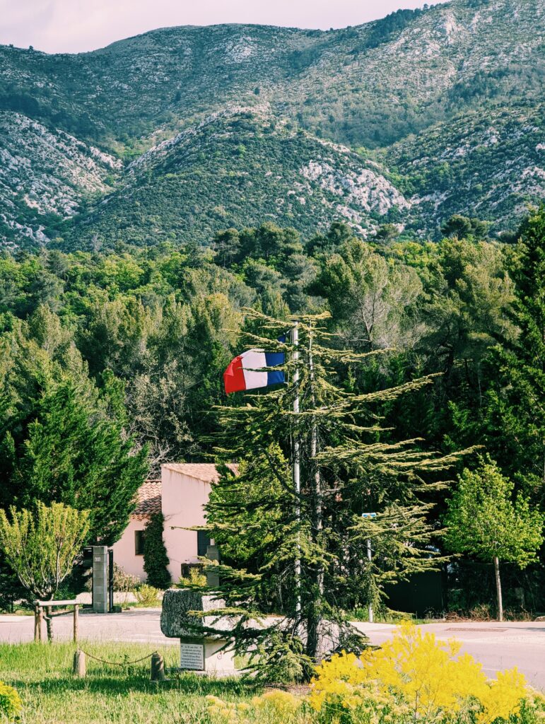 A french flag flowing near Vauvenargues in Montagne Sainte-Victoire