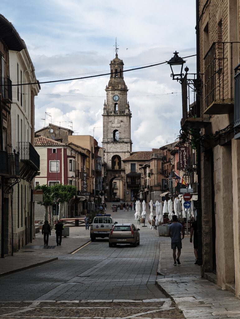 The main street in Toro with the Torre del Reloj in the background
